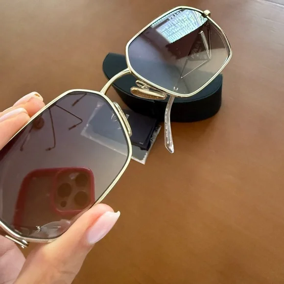 Prada Women's Sunglasses with Gold Frame and Grey Lenses - Picture 3 of 4